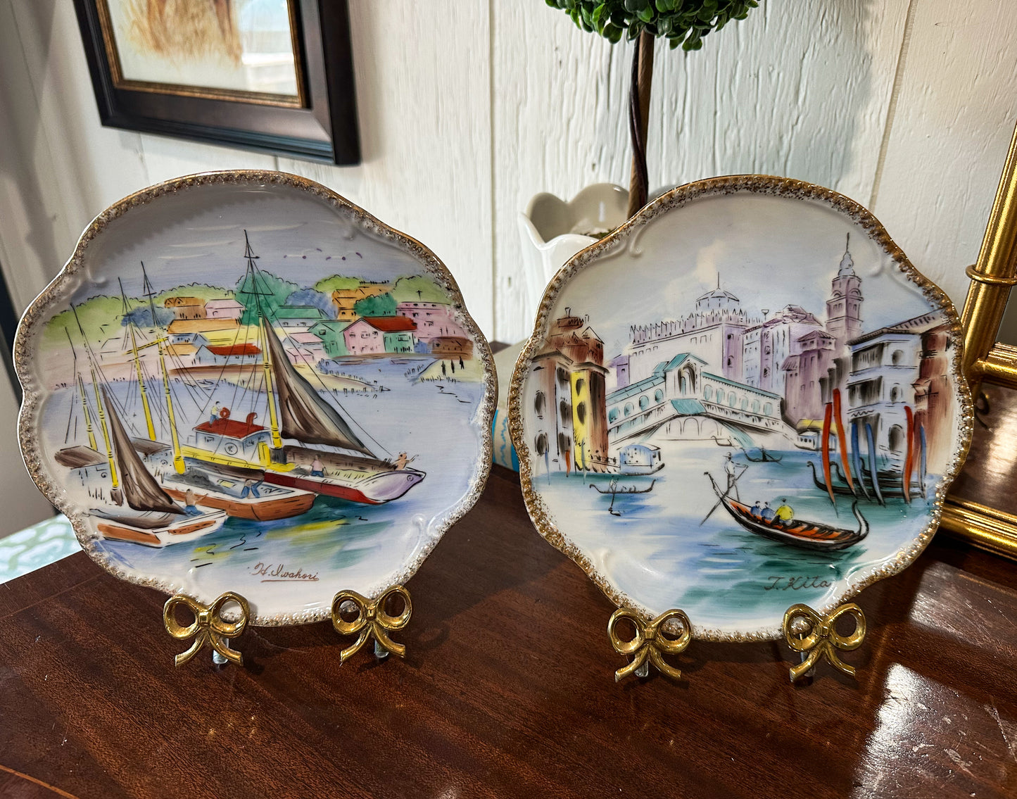 Pair of Lipper & Mann European Scene Plates